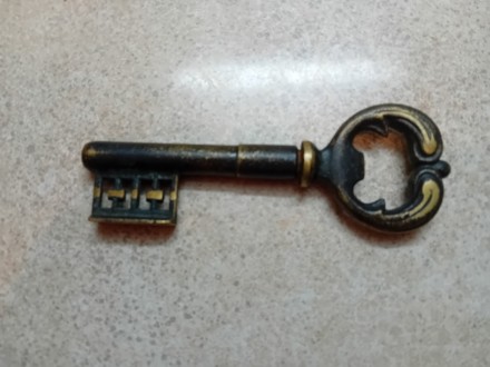 Otvarac za flase u obliku kljuca