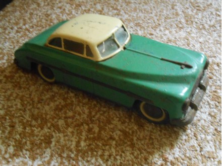 Vintage Packard Hungary Friction Tin Toy Car Oldsmobile