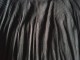 Crna plisirana suknja od trikotaže slika 3