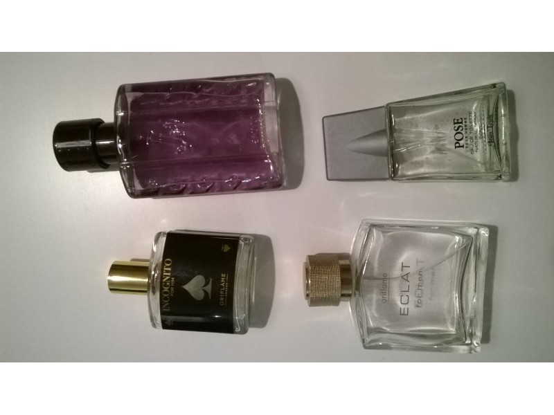 Prazne bocice od parfema i kutije