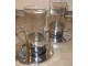 Set vatrostalne čaše,držači i tacne 2 kom. slika 1
