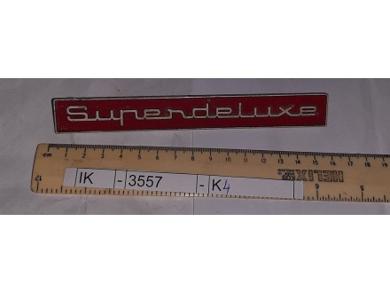 Znak Superdeluxe, neka stara vintage veš mašina.	IK	-	3