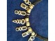 crna upletena ogrlica sa metalnim ukrasima slika 1