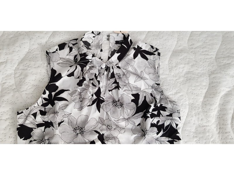 „Orsay“ elegantna šarena crno-bela bluzica vel.38